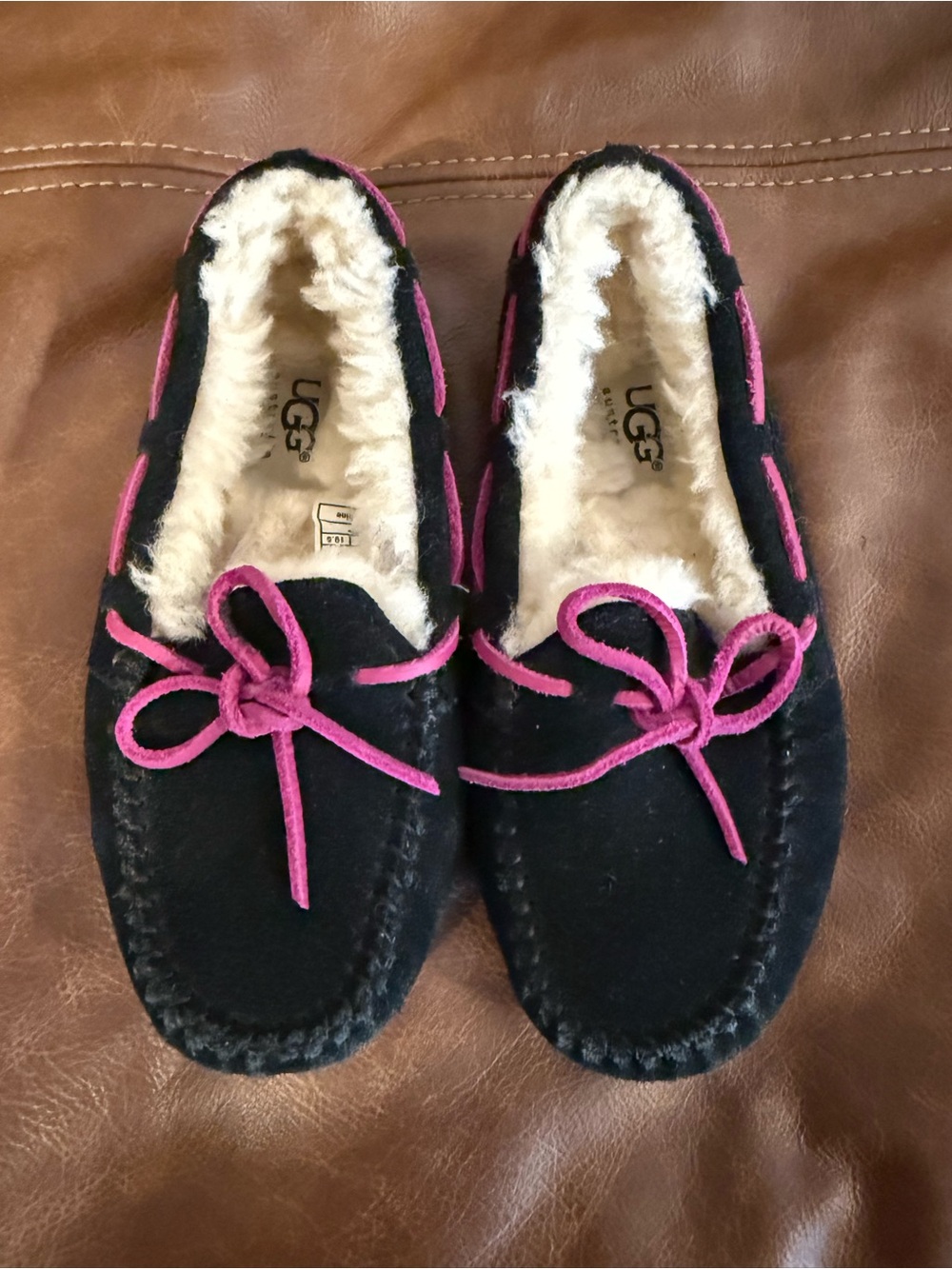 UGG Girl’s Black Moccasin Slipper with Pink Laces